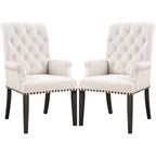 Fauteuil de salle à manger capitonné beige avec dossier roulé et clous décoratifs