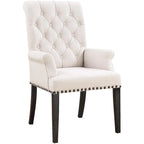 Fauteuil de salle à manger capitonné beige avec dossier roulé et clous décoratifs